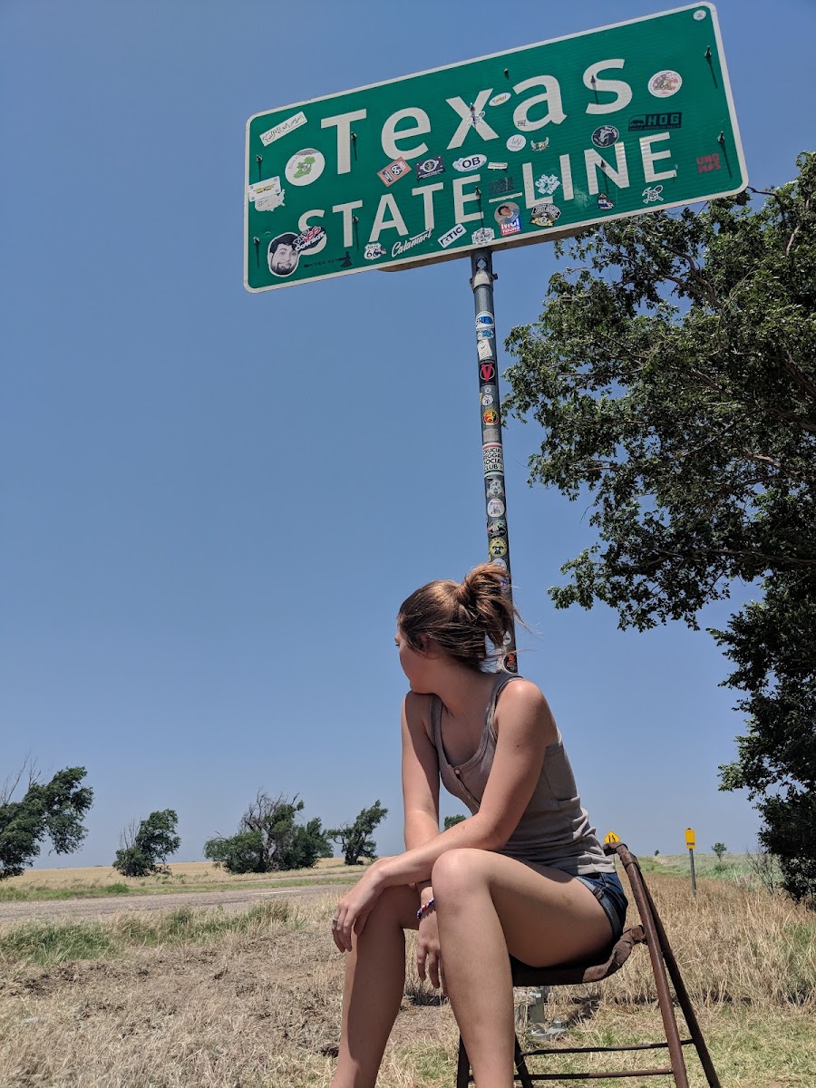 Texas State Line sign